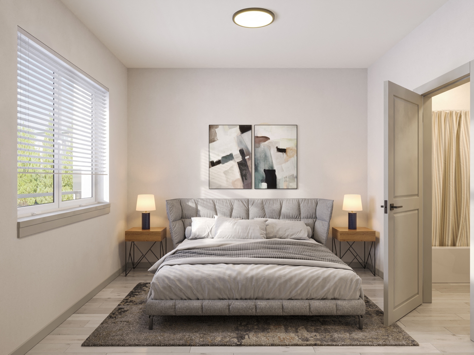 Large bedroom with window lighting and attached bathroom